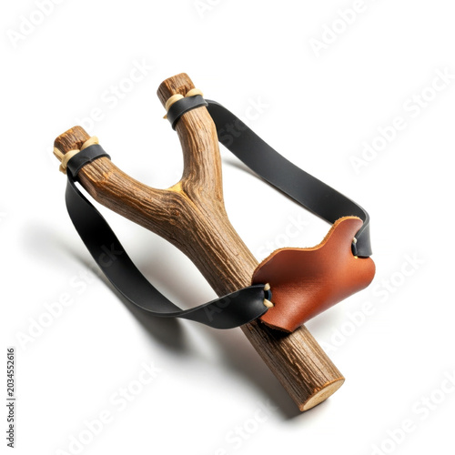 Traditional handmade wooden toy slingshot isolated on white background for retro children outdoor game hobbies