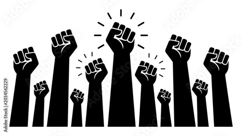 Fotografija Raised clenched fists black silhouettes with one highlighted for protest and sol