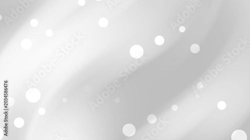 Glowing white dots on a gray background with a bokeh effect create a mesmerizing visual abstract scene