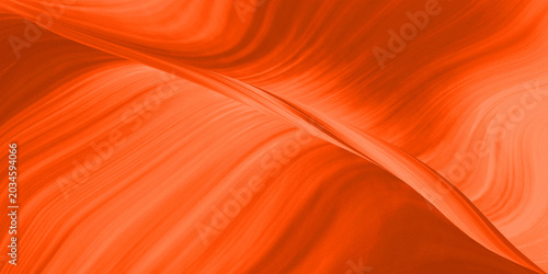 Fotografi Abstract orange gradient background with a dynamic composition of diagonal lines that divide the image and create a texture that resembles an abstract sandstone canyon