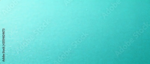 Teal Textured Background: A smooth, subtle teal textured surface with a gentle gradient, offering a clean and calming backdrop for design projects.