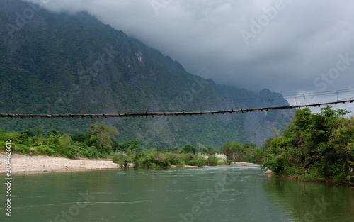 A view of the footbridge over the Nam Song River in the morning.