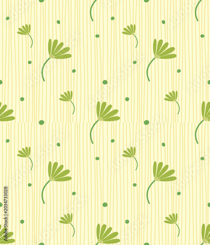 Photos Summer themed and cute seamless pattern background with light green floral motifs and dots on a yellow vertical striped background