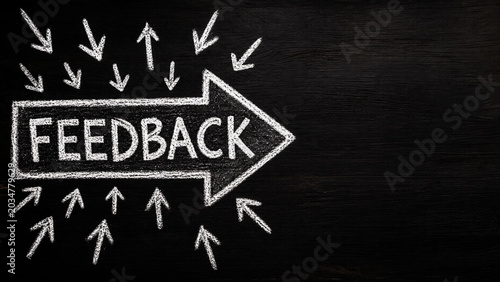 Customer Feedback Business Communication Concept with Direction Arrow and Review Evaluation on Blackboard Background