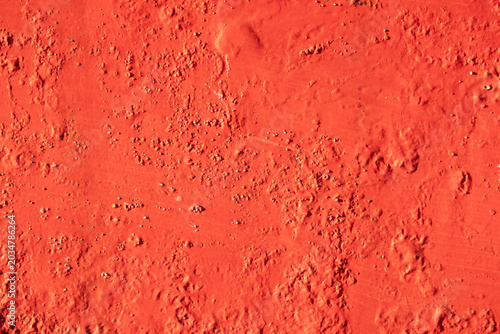 Konstfotografi Rough-textured cement or plaster wall painted red