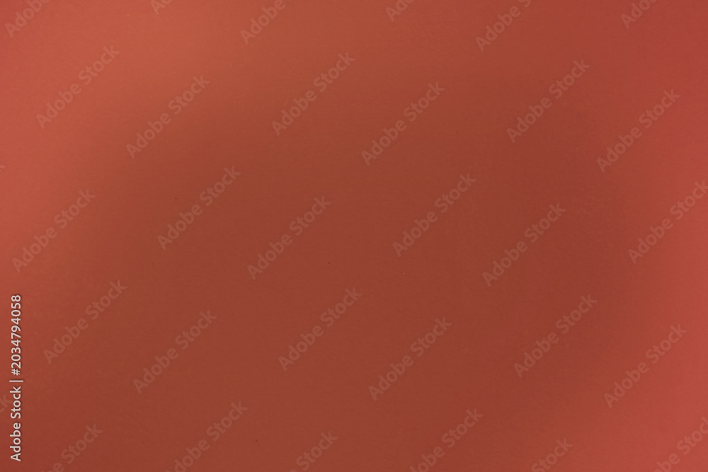 Fototapeta premium Single pixel dot floats against deep red background