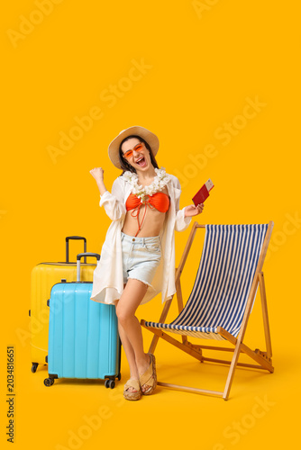Happy young female tourist ...