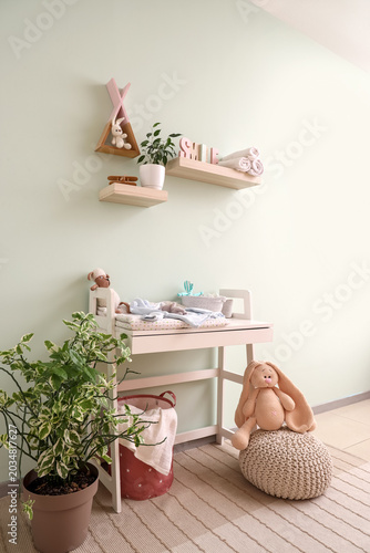 Interior of nursery with ch...