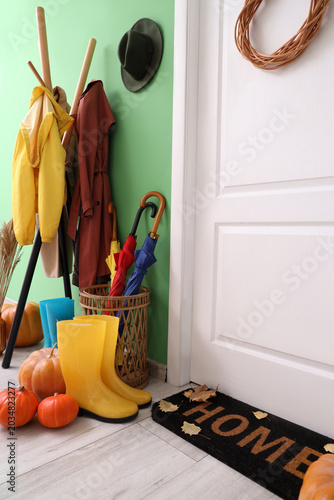 Door, umbrellas and rack of...