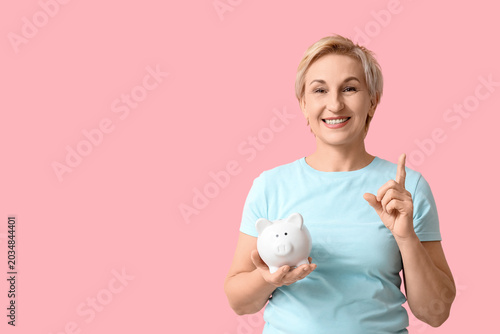 Happy mature woman with whi...