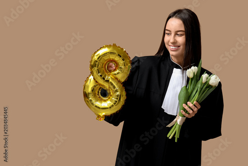 Young female judge with bal...