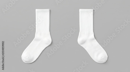 Isolated pair of blank white crew socks mockup for apparel branding presentation fashion design clothing templates