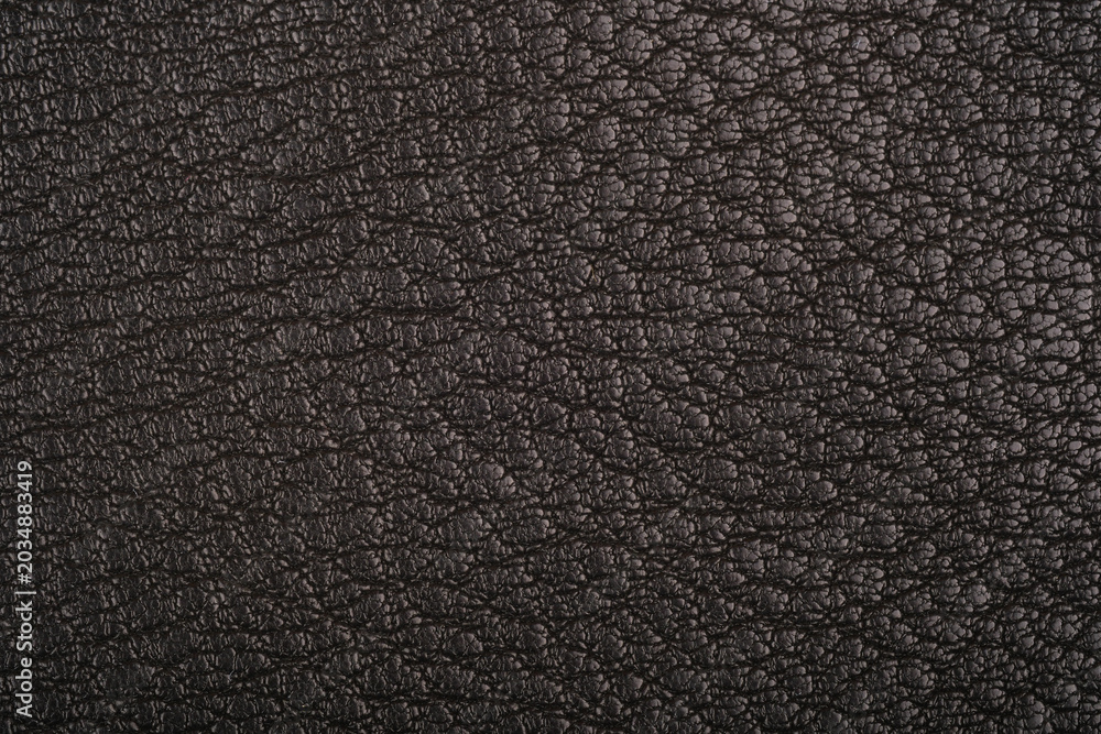 Fototapeta premium Dark leather fabric texture close up