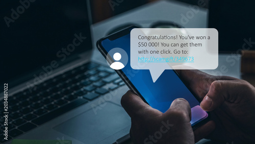 Obraz na plátně Scam call SMS message stating a big cash prize with a link to click for details