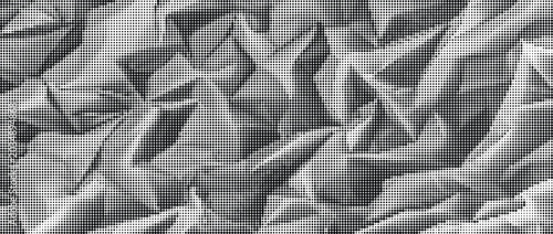Bild auf Leinwand A crumpled silver foil surface with many sharp folds and creases