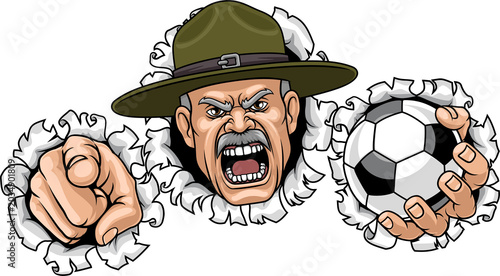 Fotografie An angry drill instructor or sergeant bootcamp army soldier cartoon character holding soccer football ball and pointing sports team mascot illustration