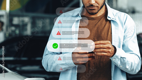 Scam call text message warning sent to a person at a car park location in the daytime