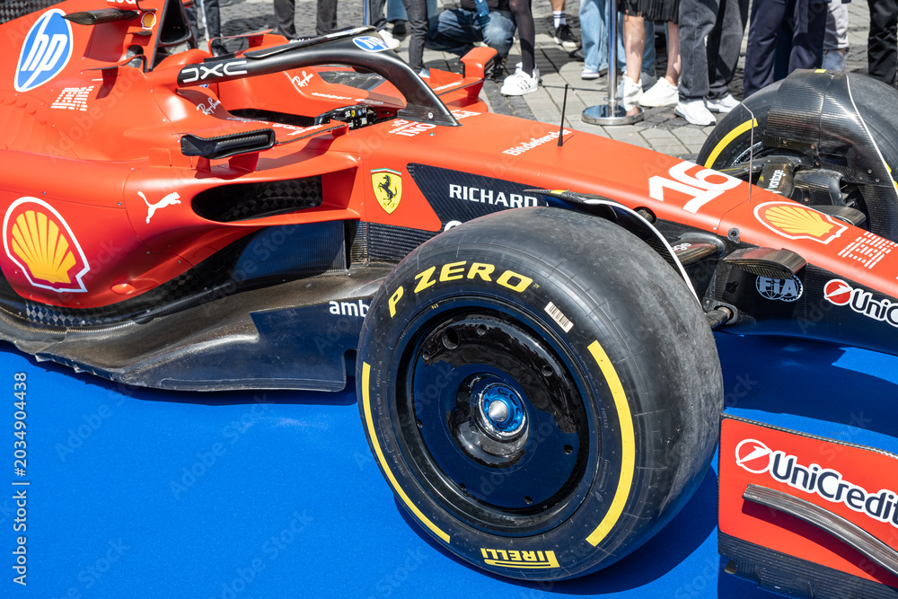 Naklejka premium Sibiu, Romania - May 25, 2026 a Ferrari SF-26 Formula 1 car unveiled for the 2026 exhibited in the large square in the city center Sibiu