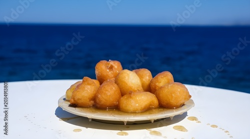 Honey Dripping Loukoumades Close-Up