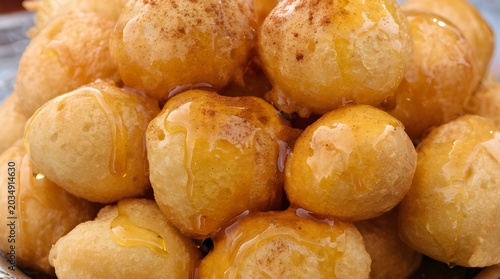 Honey Dripping Loukoumades Close-Up