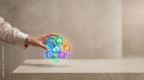 A person's hand holding a colorful cube with icons representing diverse applications and cloud productivity solutions