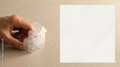 Individual holding a piece of paper representing marketing strategies and concepts for growth and development