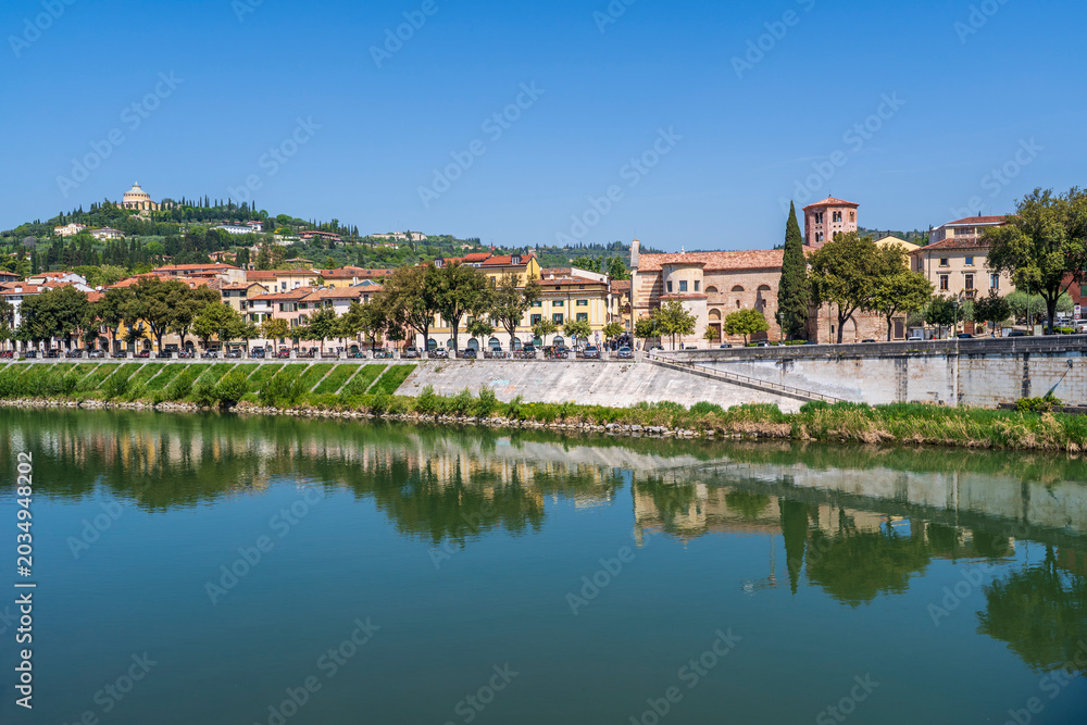Fototapeta premium The Adige River coastline view in Verona City of Italy