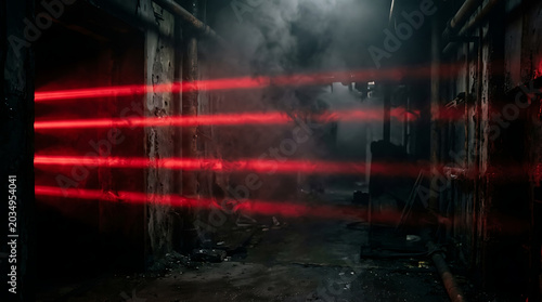 Red laser beams cut through dark smoke in abandoned industrial hallway