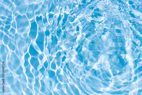 Foto Blue water with ripples on the surface