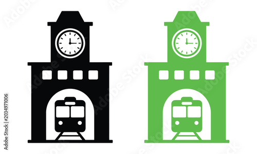 Bild auf Leinwand Clock tower with train entering green and black archways