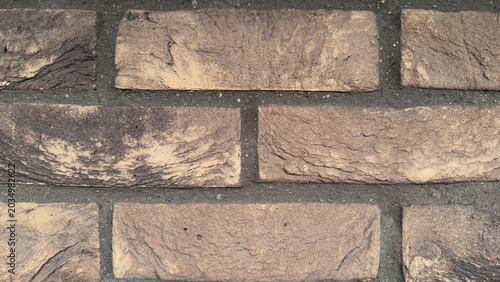 Принти на полотні Macro yellow clinker brick texture background, detailed ochre and brown brickwor