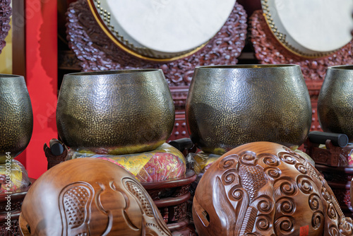 Obraz na plátne traditional buddhist ritual instruments like bronze singing bowl and wooden fish