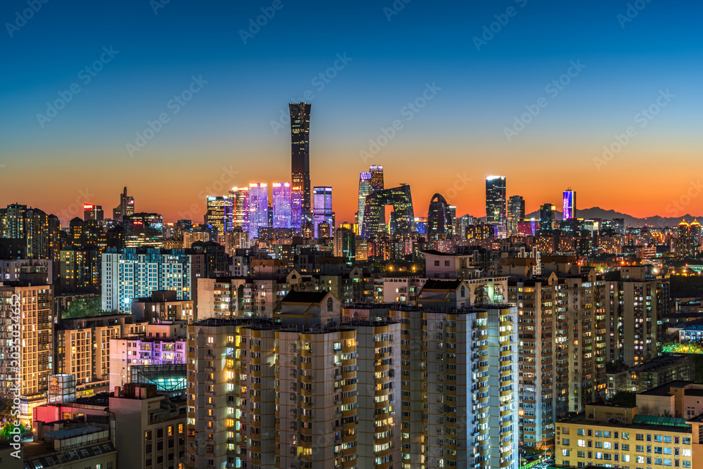 Fototapeta premium Night view of modern urban architecture in Beijing's Central Business District, China