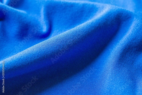 Blue fabric texture with soft folds