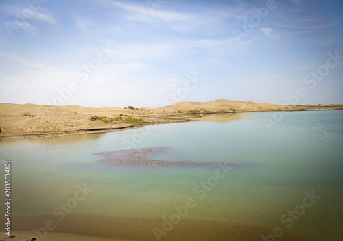 Photos Taklamakan Desert, Xinjiang, China
Vast desert landscape of Taklamakan Desert in Xinjiang, China