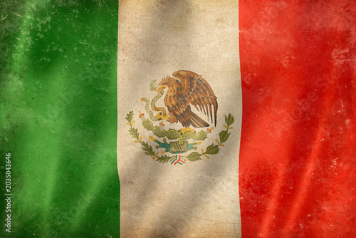 Old vintage flag of Mexico, worn and stained