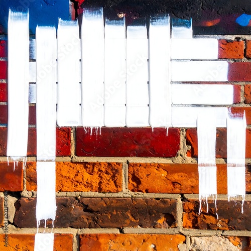 Abstract White Paint Strokes Covering Red Brick Wall Surface
