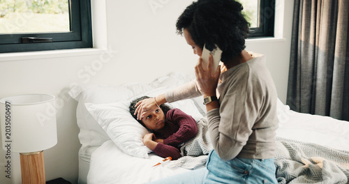Canvas Print Forehead, phone call and sick child with mother in bed together for healing, recovery or support