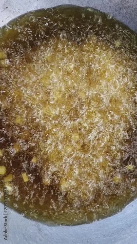 cooking cooking oil in a pan