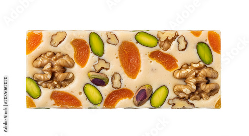 White nougat bar with dried apricots, pistachios, and walnuts as clean cutout