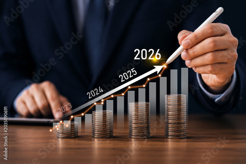 Obraz na plátně File #:  1872781998
Business hand drawing upward financial growth chart wit