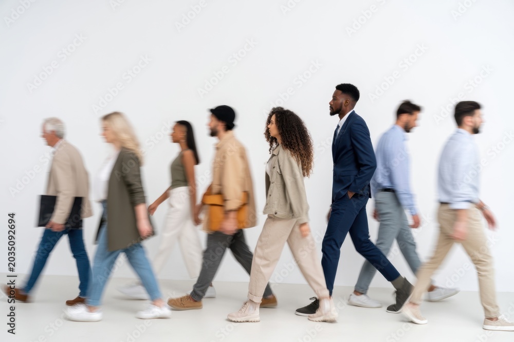 Obraz premium The Diverse Group of People Walking in Single File on White Background