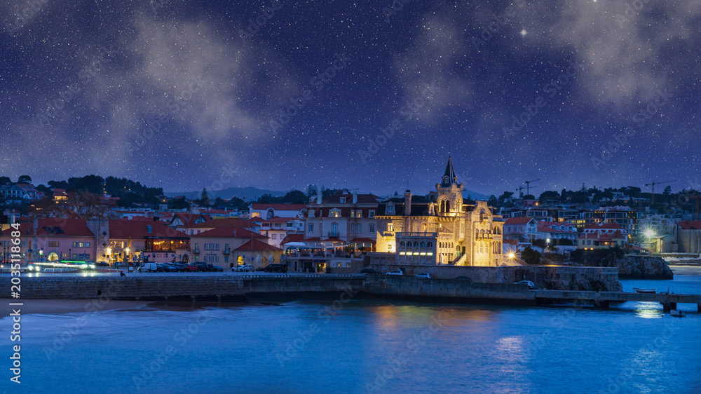 Fototapeta premium Cascais at night with stars. Palácio Seixas and Santa Marta waterfront.