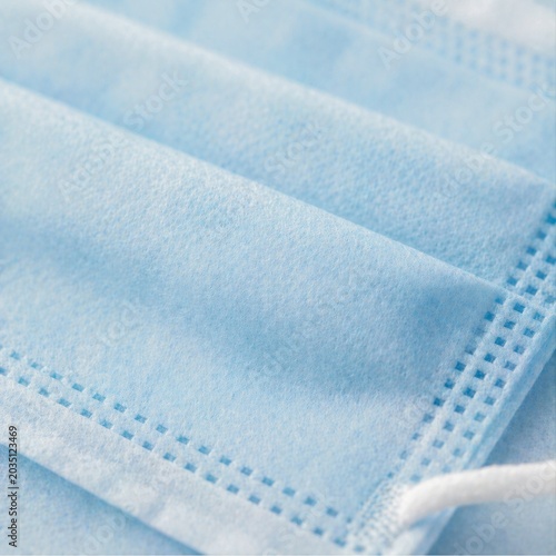 Blue Surgical Face Mask Macro Texture Background for Healthcare and Medical Concept