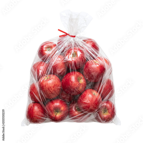 Fresh red apples in a clear plastic bag