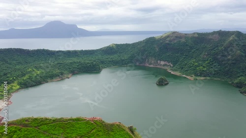 The smallest volcano in the Philippines is Taal with a green crater lake, aerial view. Tagaytay, Philippines. Green lake- Taal Volcano