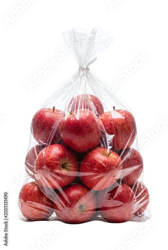 Bag of fresh red apples in transparent plastic