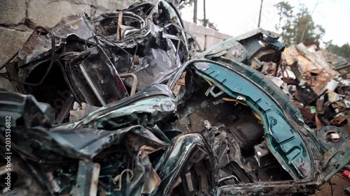 
Recycling of old cars. Automotive scrap. Recycling. Ecology and the environment. Scrap metal from old, destroyed cars. Metal recycling.