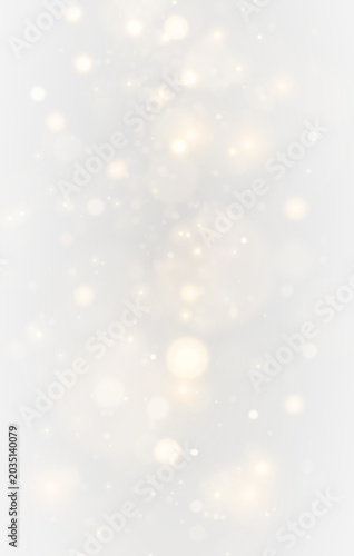 Magical glowing yellow dust sparkle effect on transparent abstract festive cinematic background atmosphere glow.