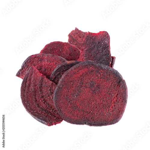 Crispy roasted beetroot chips with sea salt, isolated on white background. Healthy and crunchy natural vegetable snack. Clipping path.